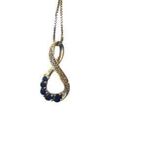 Lab created Sapphire with diamond accents in 10k white gold